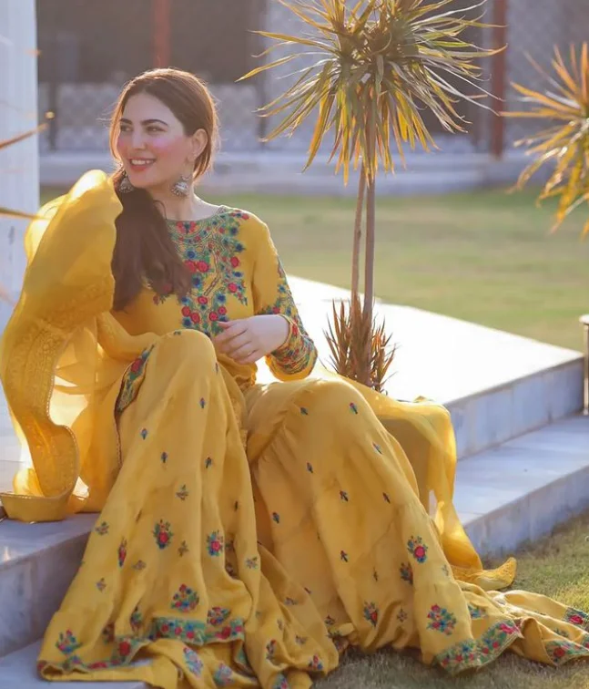 Naimal Khawar Khan in yellow musturd dress